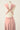 Robe Prestance rose pastel — dos 3 anneau milieu
